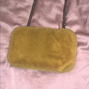 Fuzzy mustard yellow bag